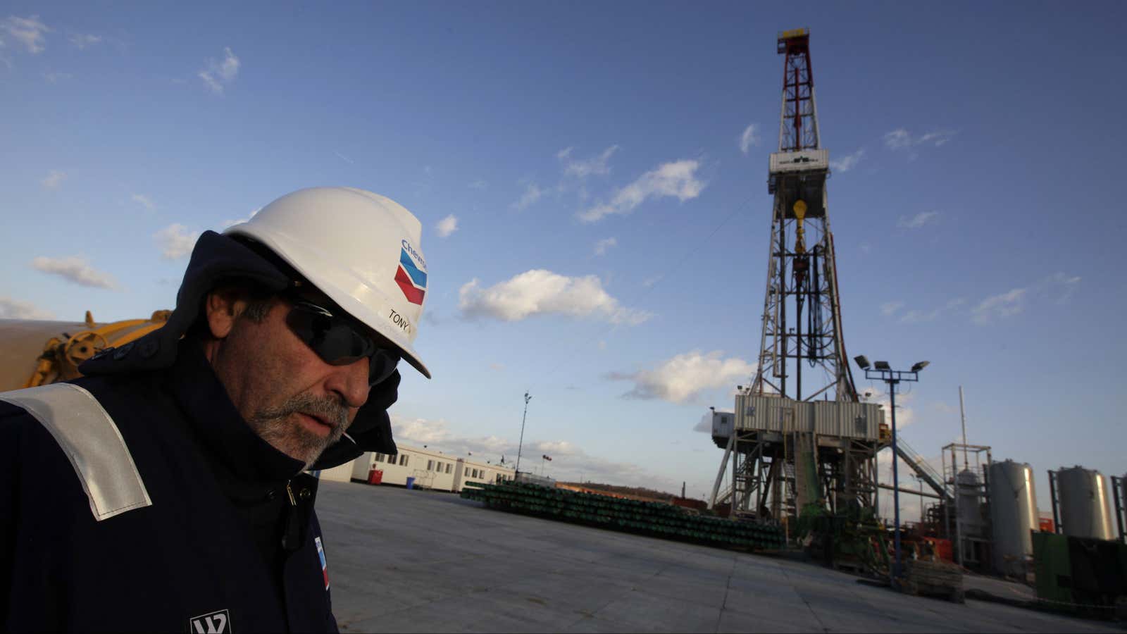 A worker stands near a drilling rig at Grabowiec 6 near the village of Lesniowice, southeast Poland, home to U.S. giant Chevron’s first shale gas well in the country.