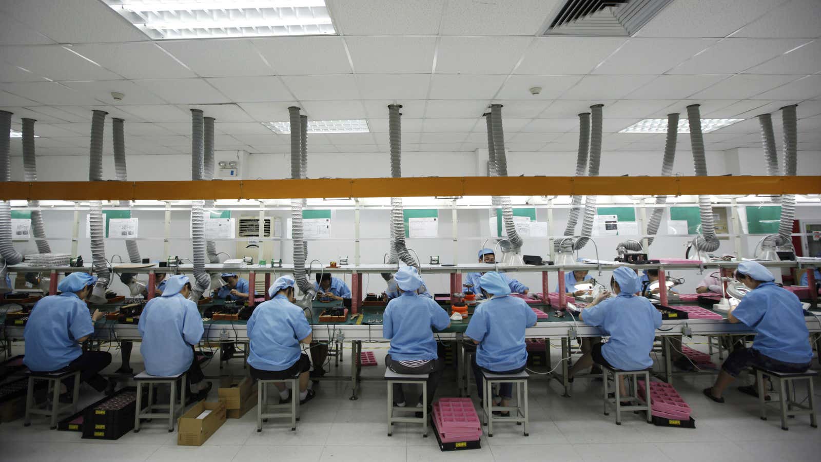 An assembly line in China that works on Apple products.
