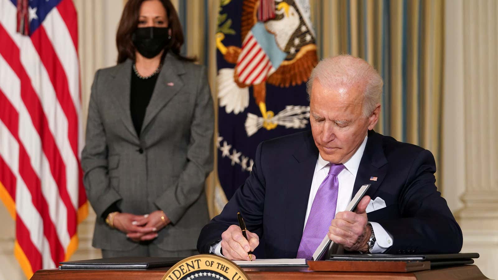 Joe Biden signs executive orders for his racial equity agenda on January 26.