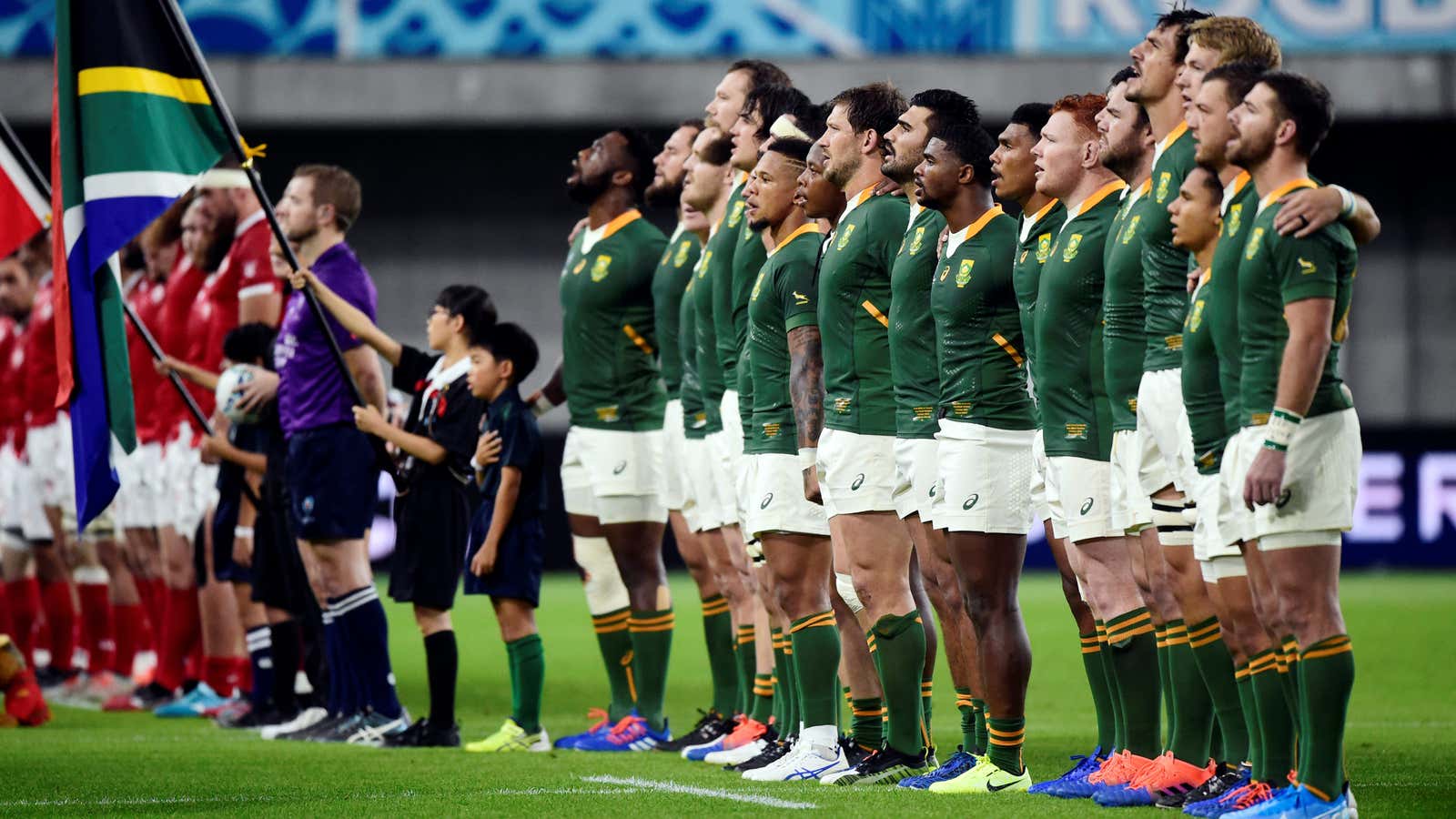 South Africa rugby players line up during the national anthem