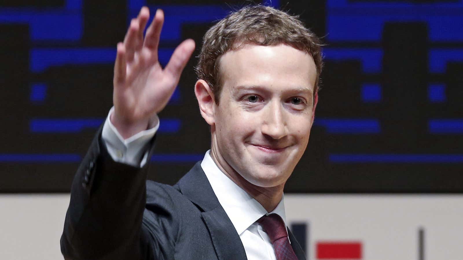 FILE – In this Nov. 19, 2016 file photo, Mark Zuckerberg, chairman and CEO of Facebook, waves at the CEO summit during the annual Asia…