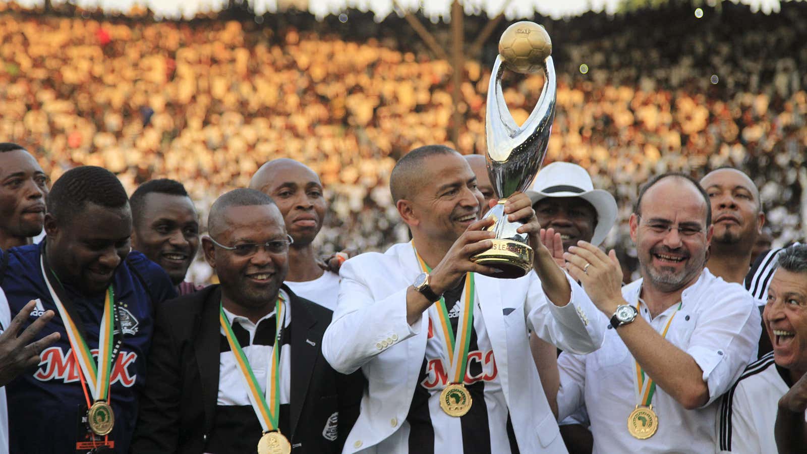 Congolese politician and businessman Moise Katumbi with members of his soccer team TP Mazembe after winning their fifth African Champions League title.