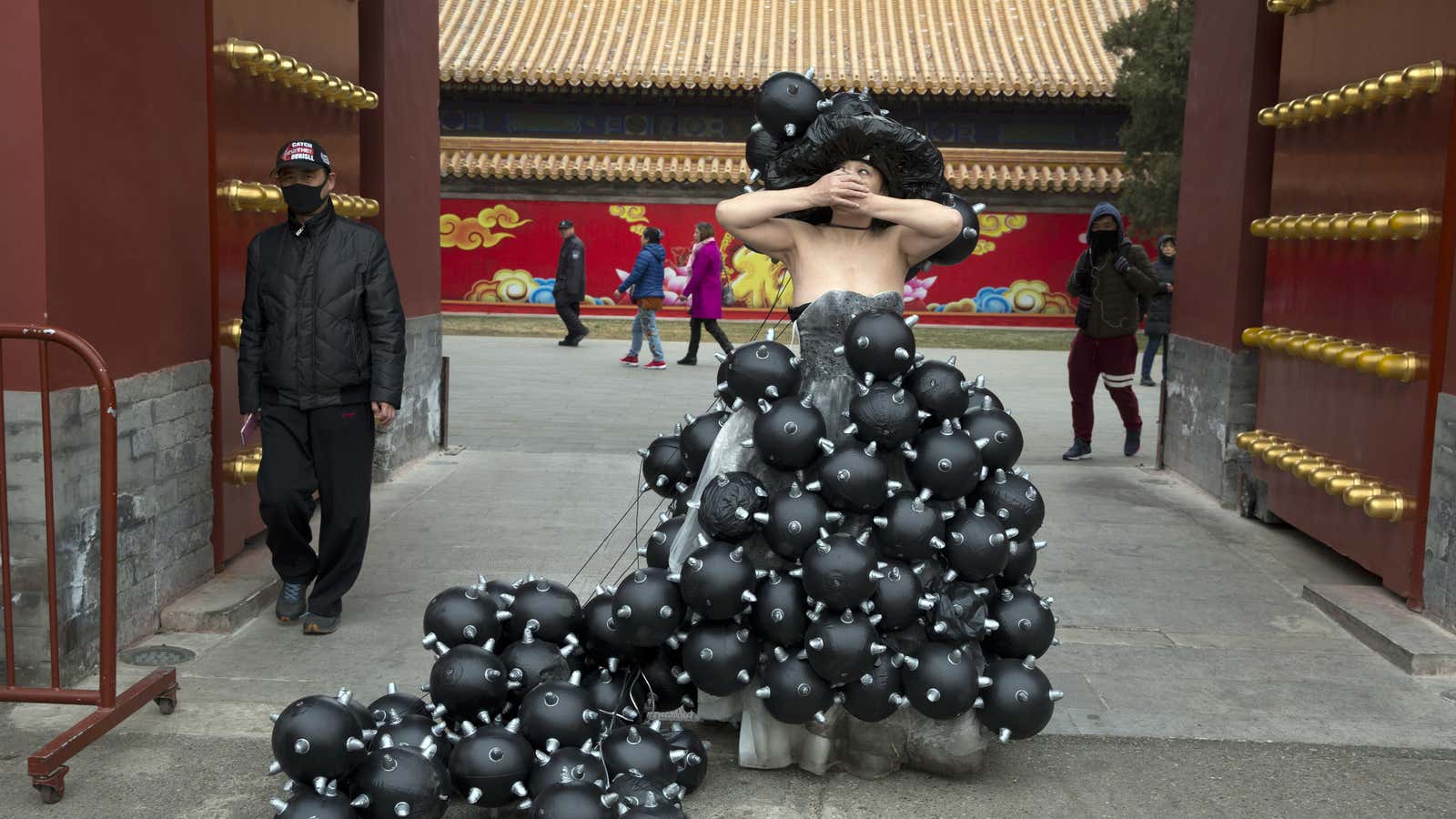 Performance artist Kong Ning raising awareness of air pollution in Beijing.