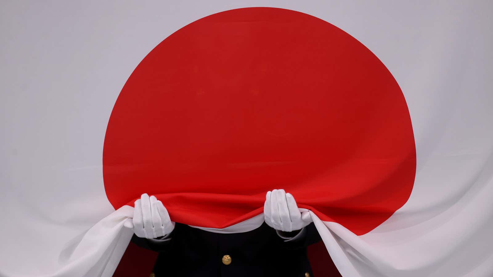 Tokyo 2020 Olympics – Karate – Men’s Individual Kata – Medal Ceremony – Nippon Budokan, Tokyo, Japan – August 6, 2021. The Japanese national flag…