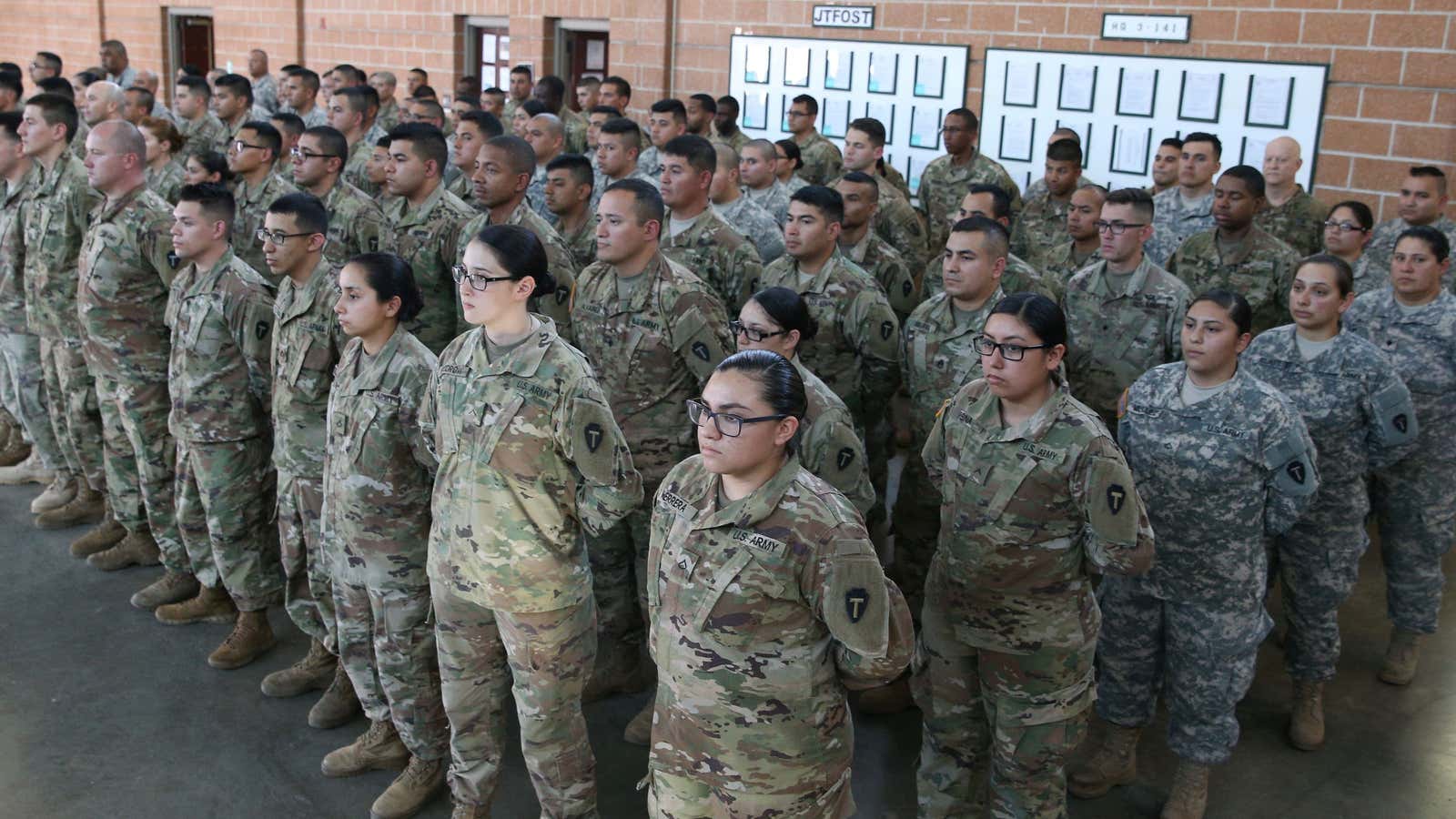 Members of the Texas National Guard await a speech on border security, April 2018.
