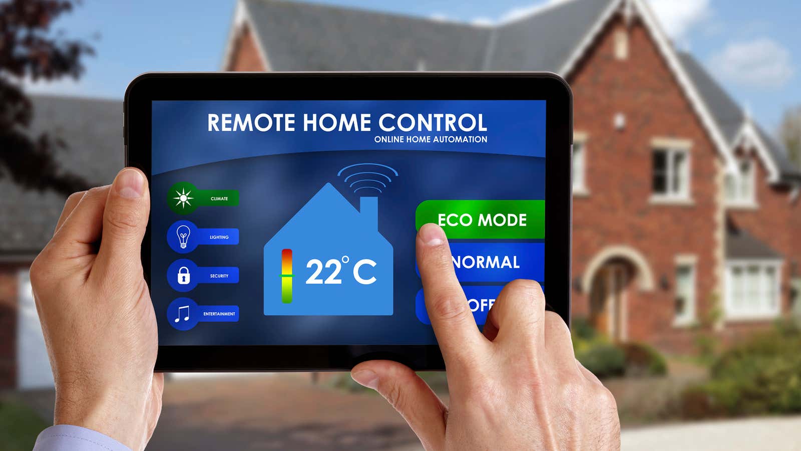 Holding a smart energy controller or remote home control online home automation system on a digital tablet. All screen graphics made up.