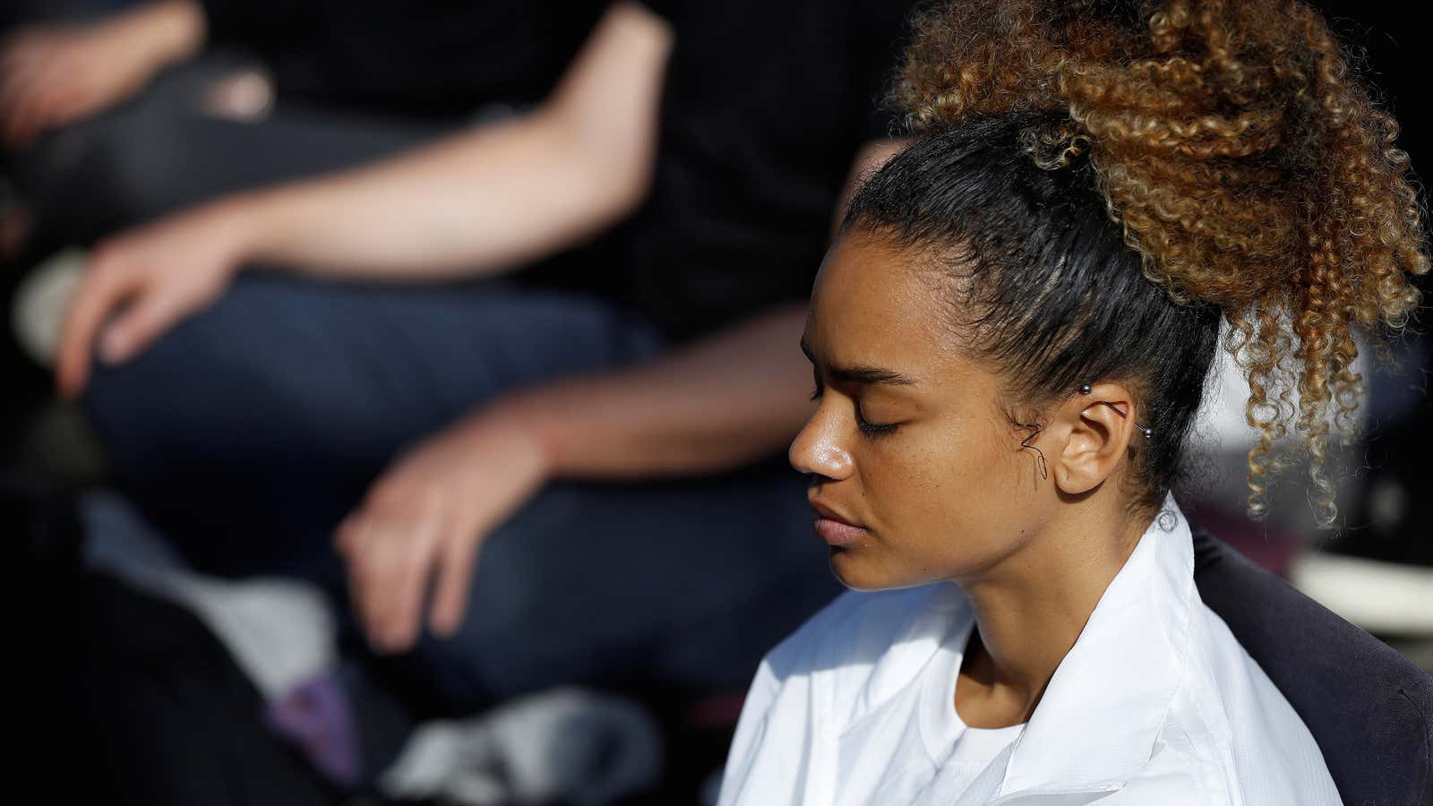 Participants meditate during an event in The Gherkin in London’s financial district on World Meditation Day, Britain, May 21, 2019.