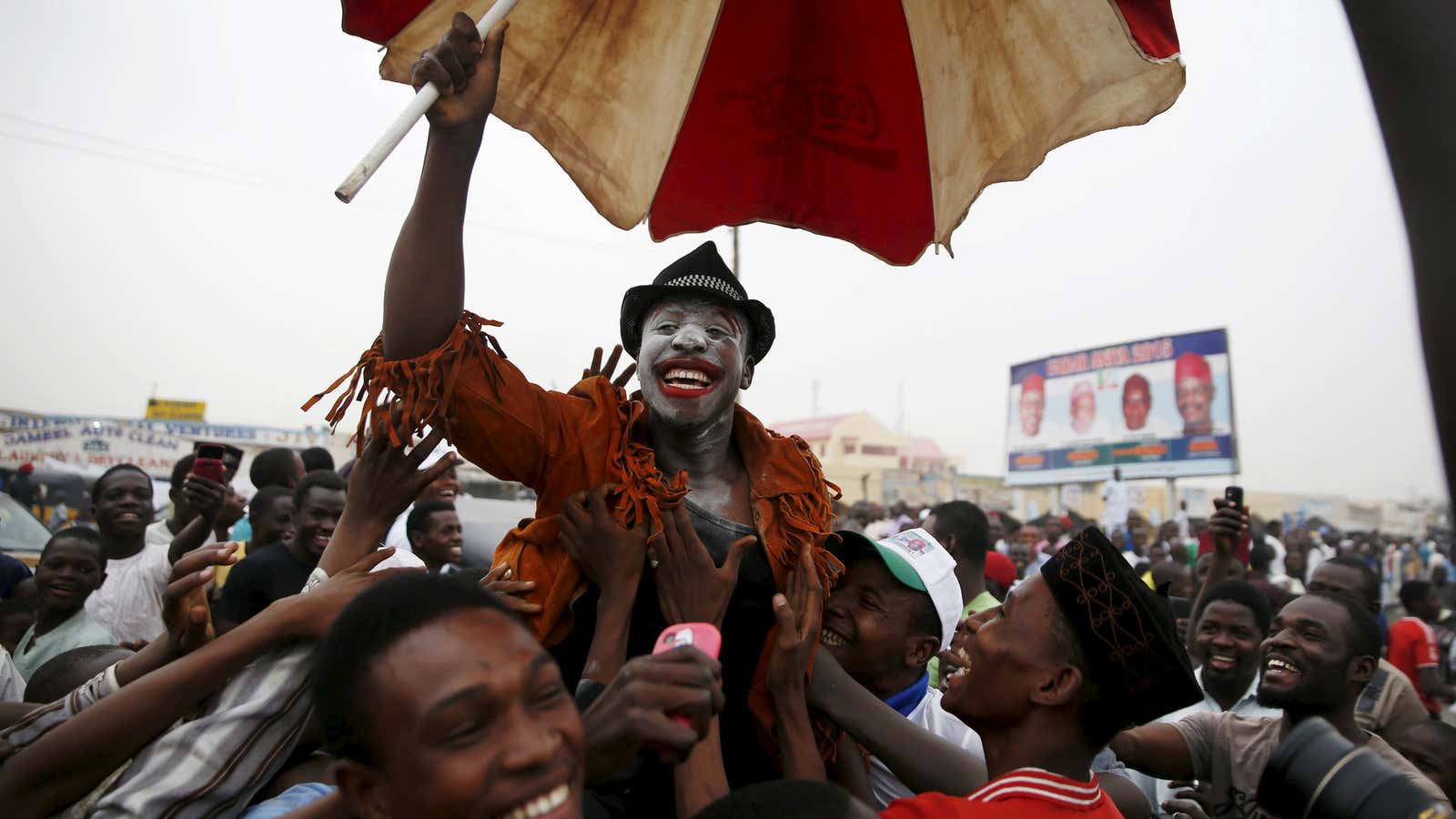 Nigerian voters celebrating the victory of Muhammadu Buhari.