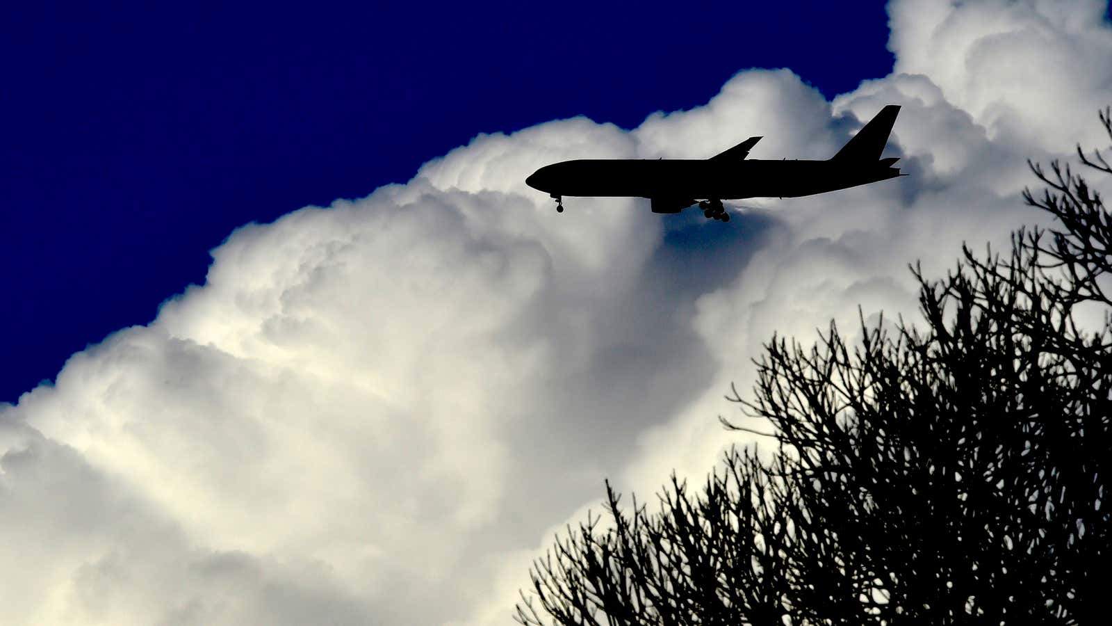 A passenger aircraft approaches London’s Heathrow Airport.