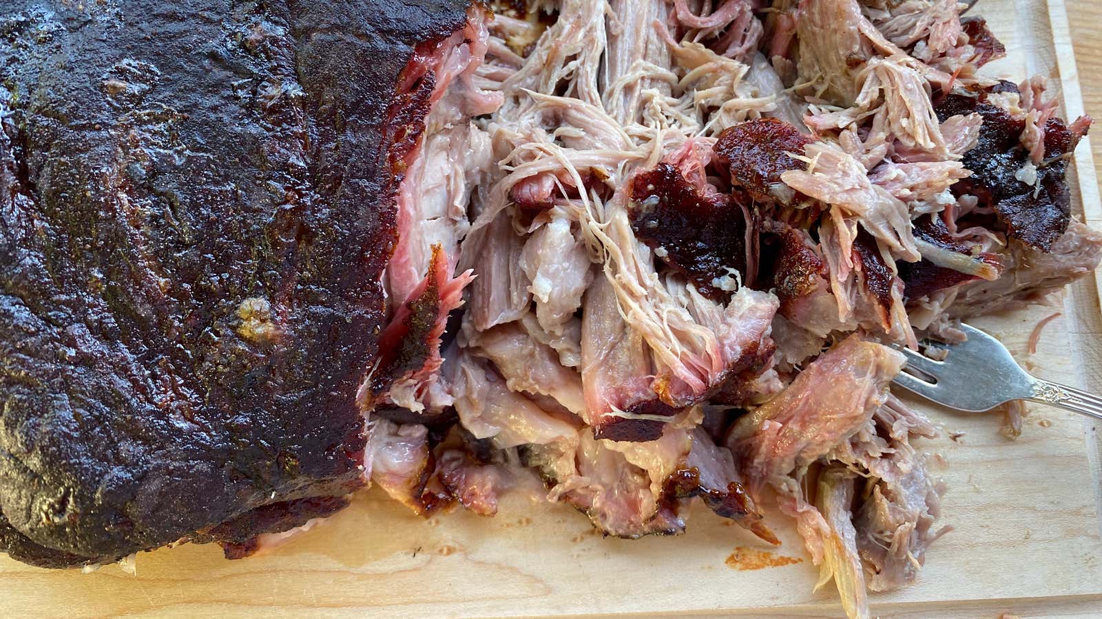 How to Smoke Your First Pork Shoulder on a Charcoal Grill