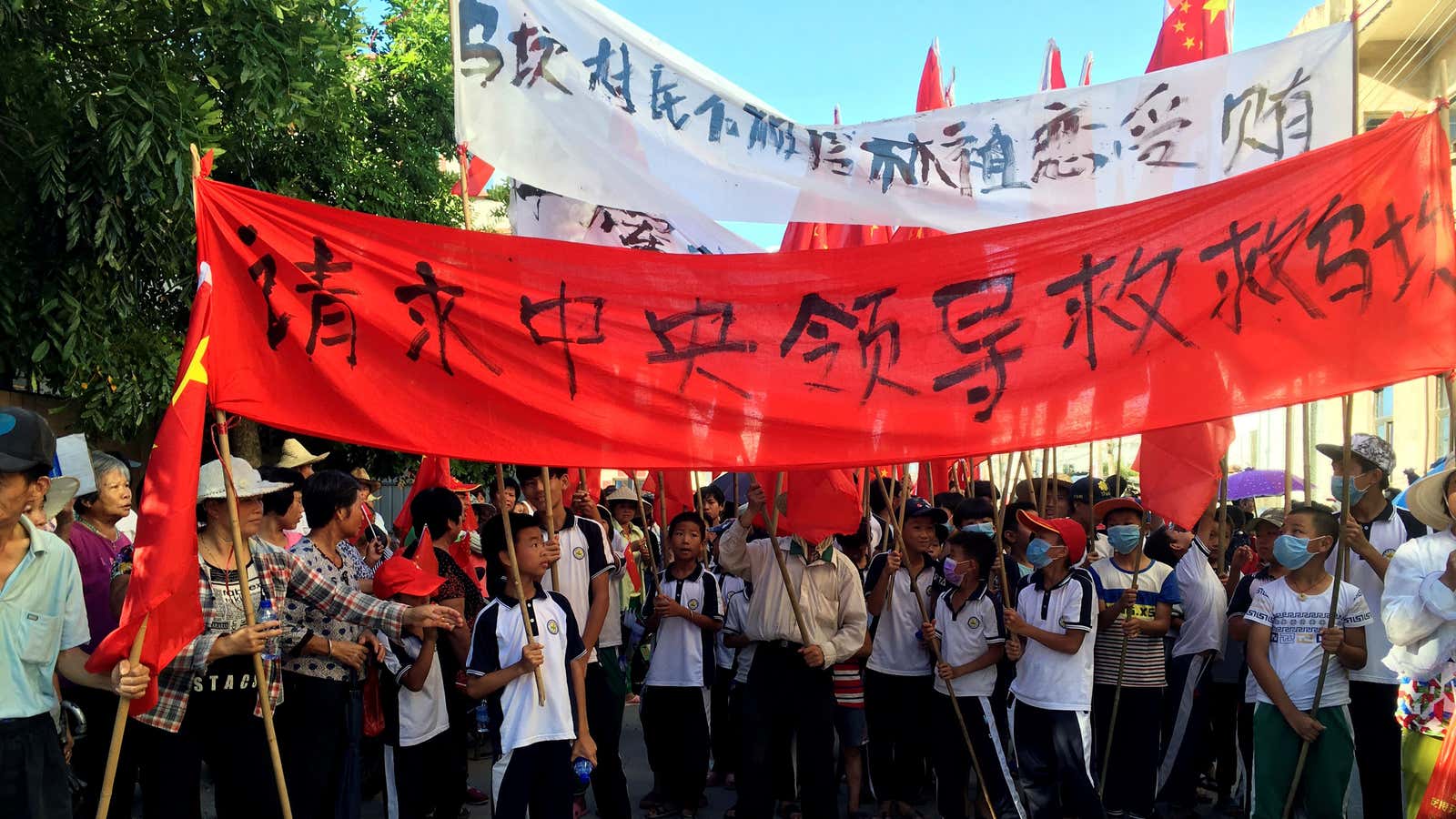 Wukan villagers protest in June.
