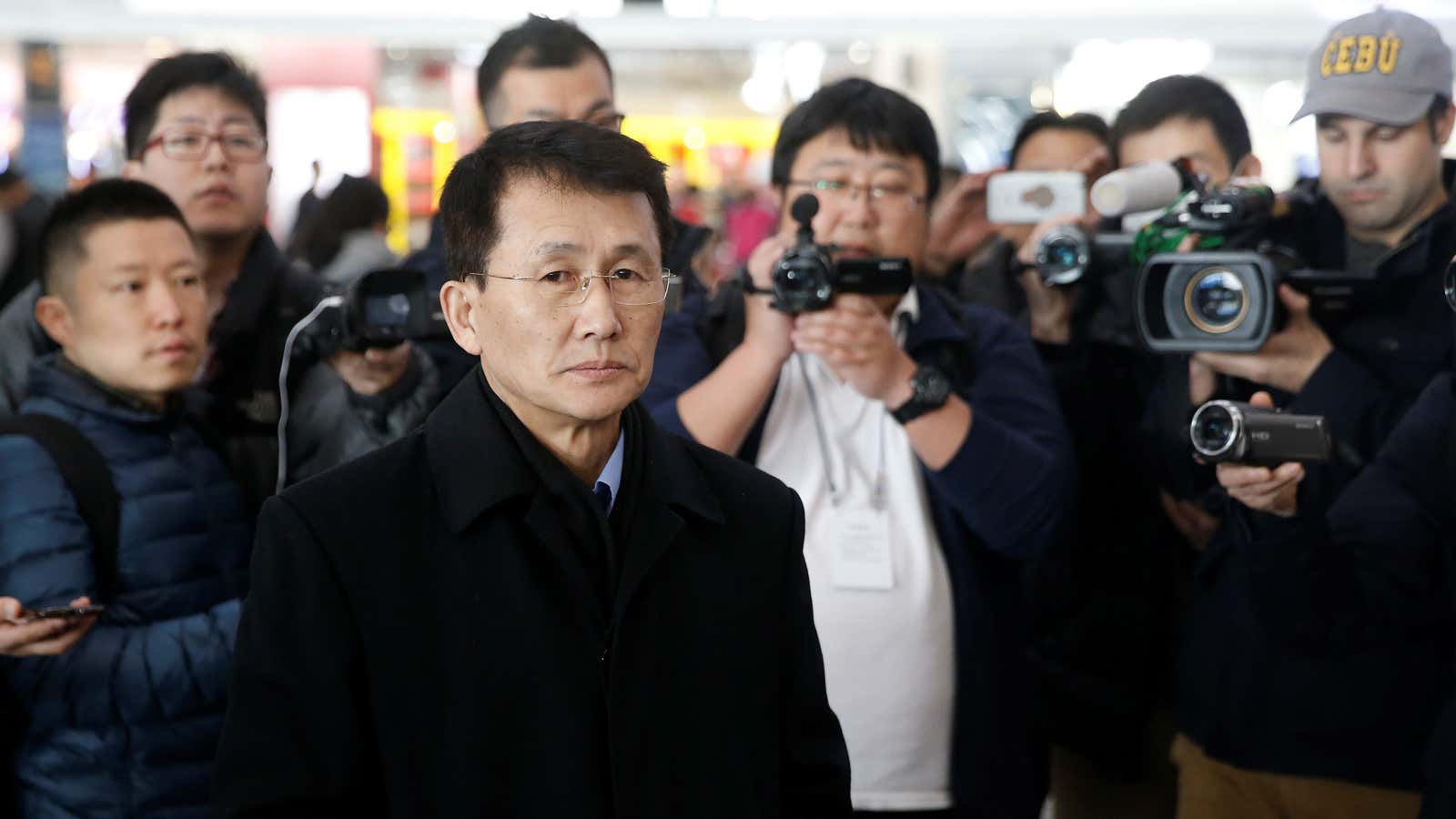 North Korean official Choe Kang-il at the airport in Beijing.