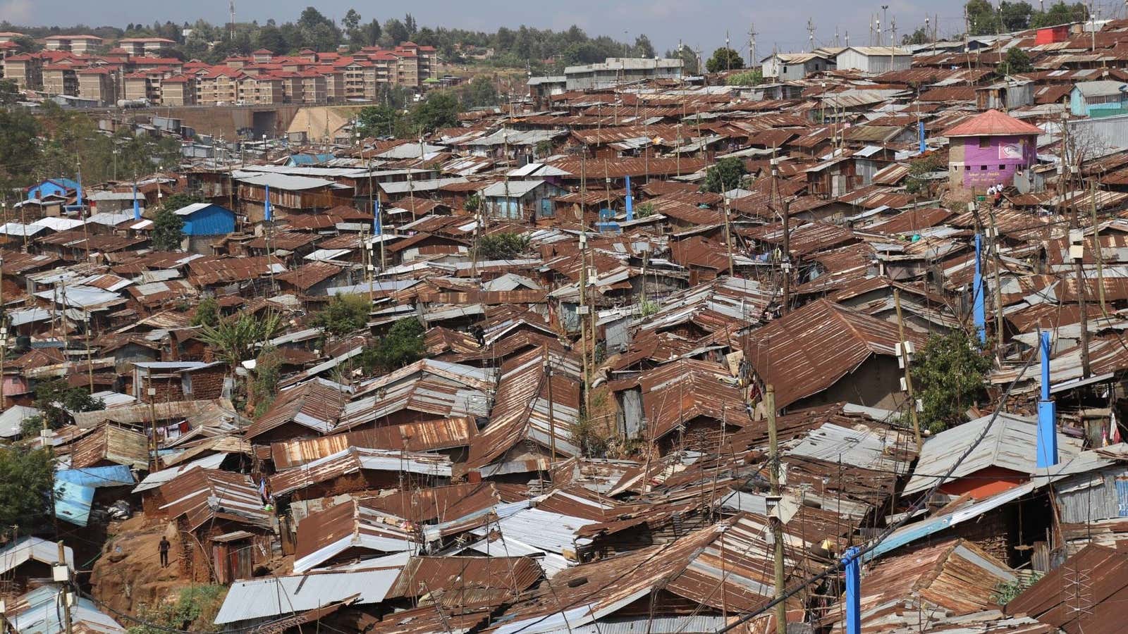 Blue pipes provide clean water to Kibera slum in Kenya