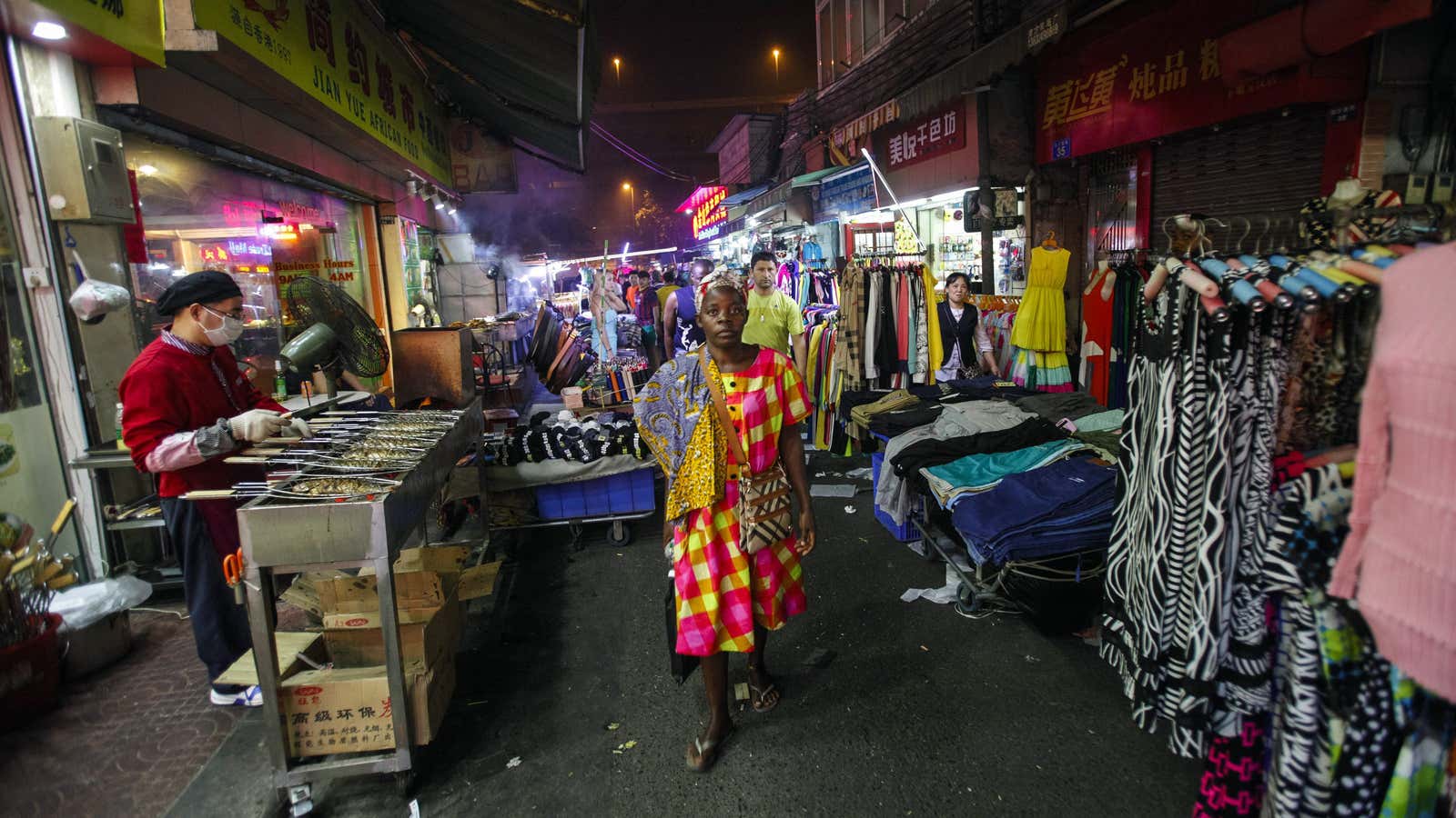A woman walks at a market in the “African village” in Guangzhou, China