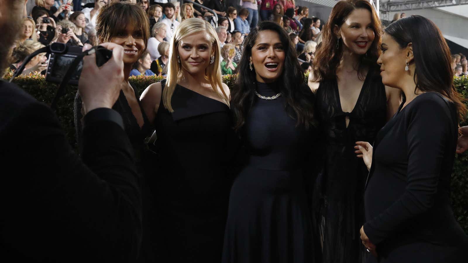 Actresses Halle Berry, Reese Witherspoon, Salma Hayek, Ashley Judd, and Eva Longoria dressed for the Golden Globes “blackout.”