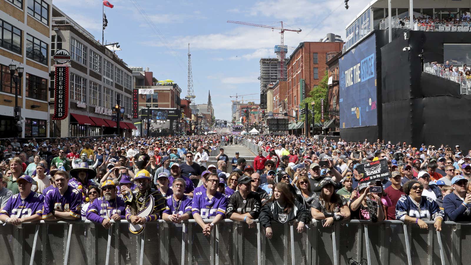 Fans lining up for the NFL Draft: They came for a football spectacle, not a political one.