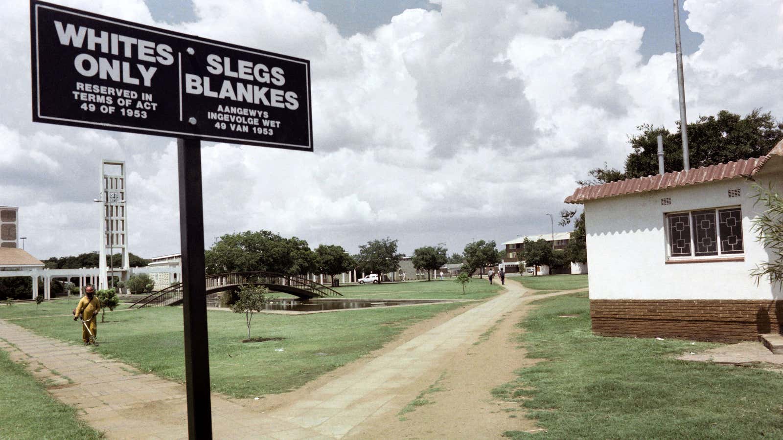 A sign reads “Whites only / Slegs Blankes” in the empty mining town of Carletonville, South Africa, in 1989.