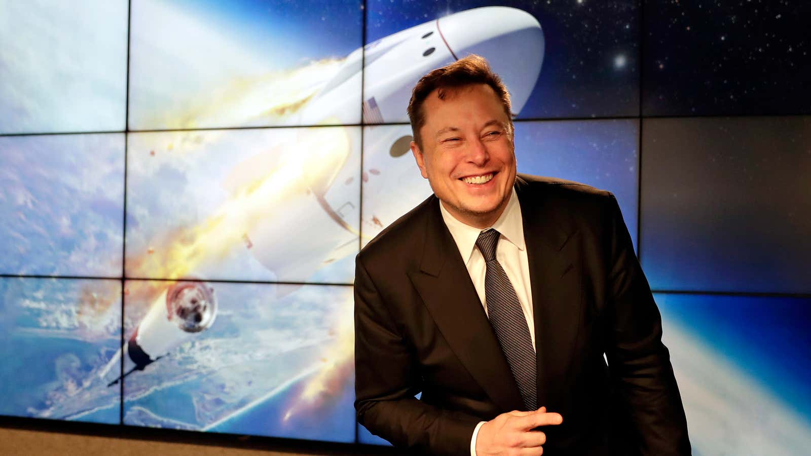 Elon Musk and the crew Dragon spacecraft.