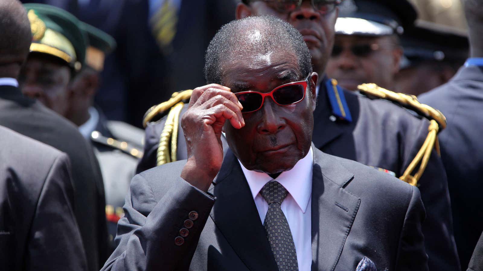 Does Robert Mugabe look like the president of a country with less money in the bank than you?