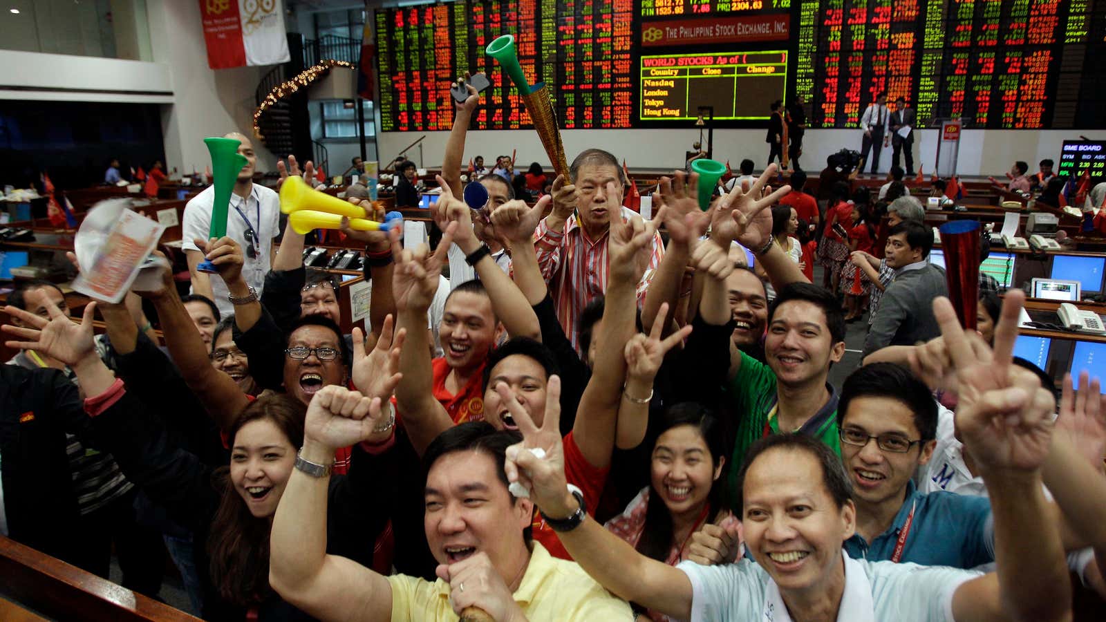 Filipino traders celebrating the end of a stellar 2012 for the nation’s stock market