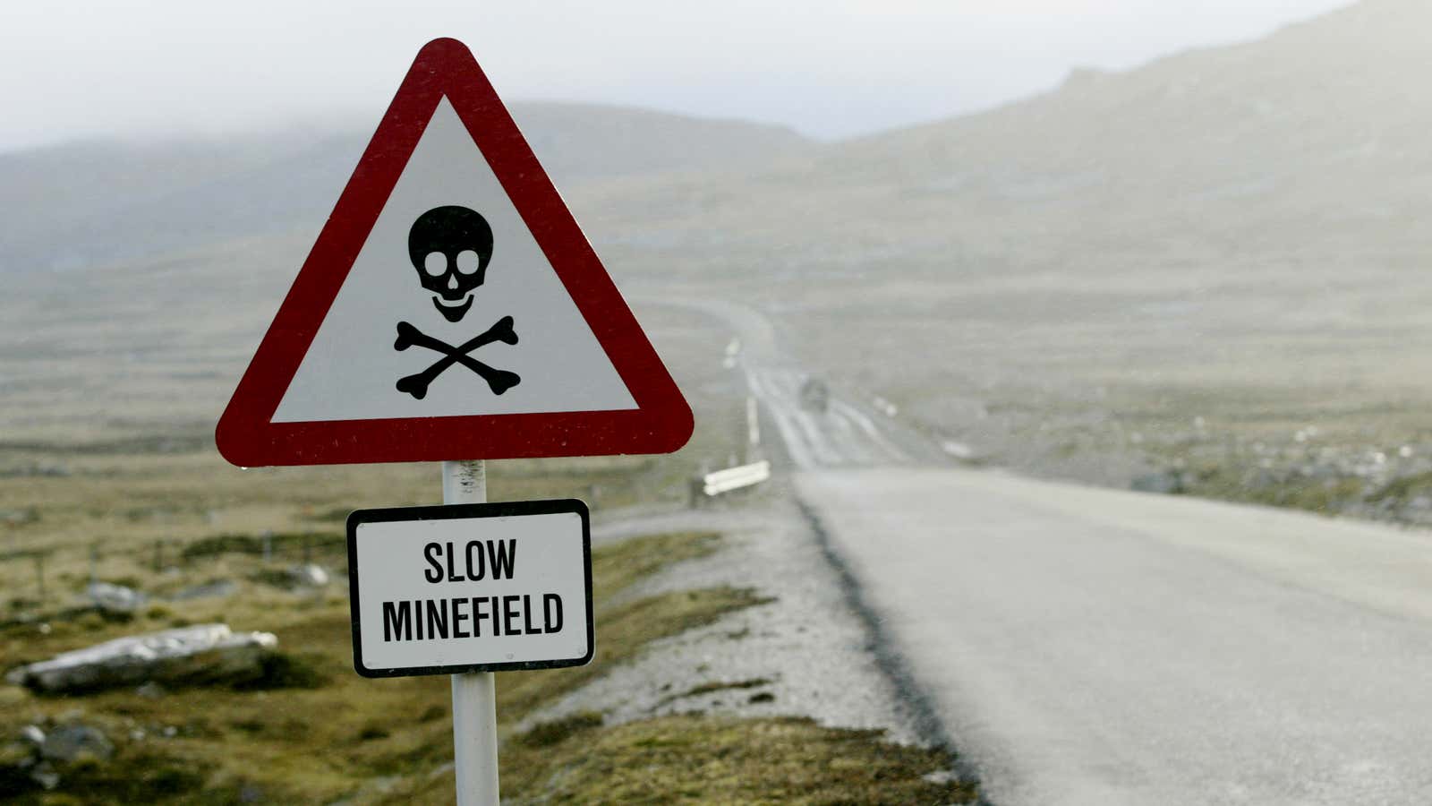A warning sign against landmines on a road in the Falklands Island.