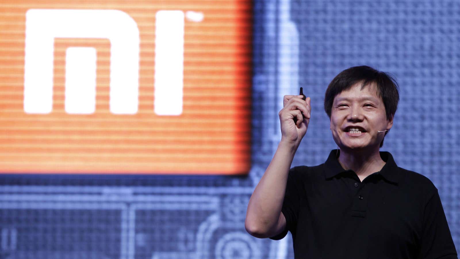 Xiaomi’s founder Lei Jun speaks at a phone launch in Beijing.