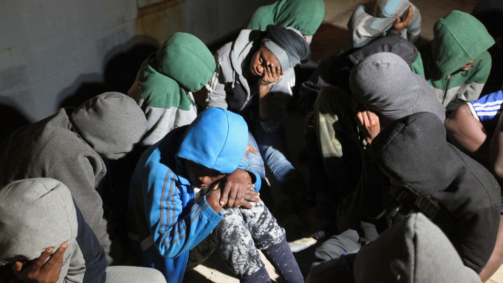 Migrants at a naval base after being rescued by Libyan coastguard, in Tripoli, Libya.