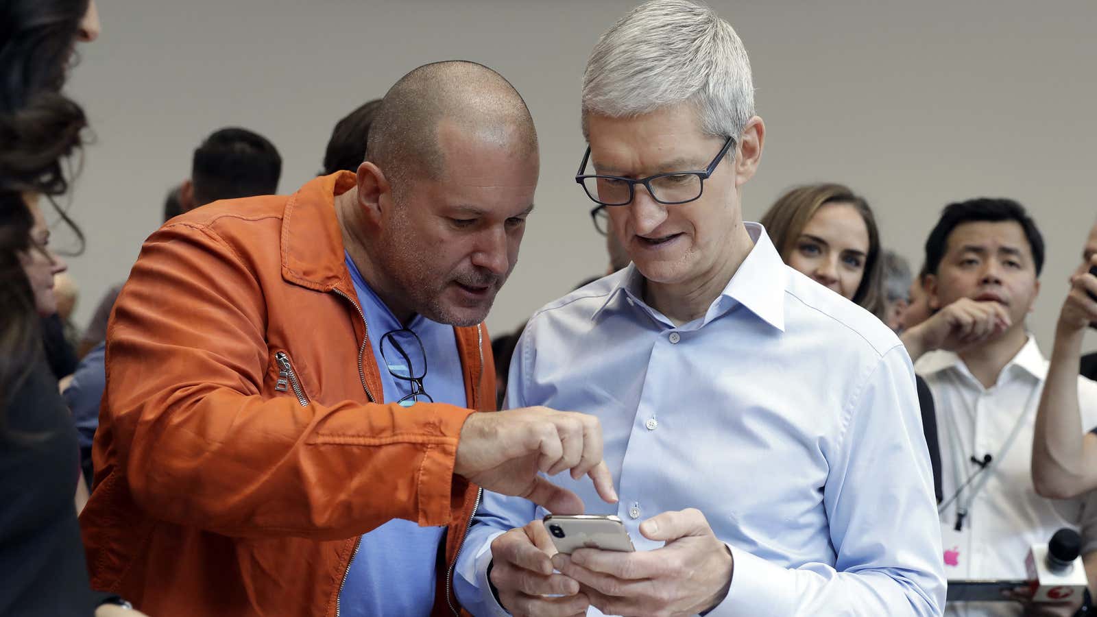 Apple CEO Tim Cook and design chief Jony Ive, presumably ordering larger stockings for their mantlepieces.