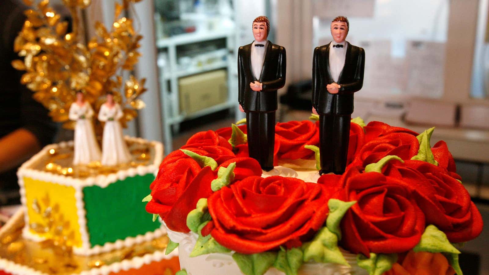 Bride and groom figurines are on display on wedding cakes at Cake and Art bakery in West Hollywood, California June 4, 2008. A California Supreme…