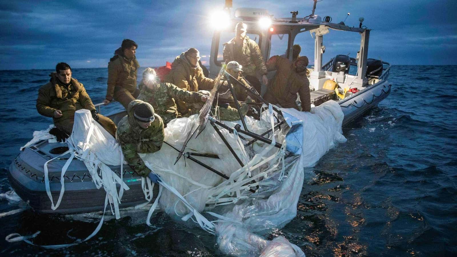 US sailors recover part of a downed Chinese surveillance balloon,.