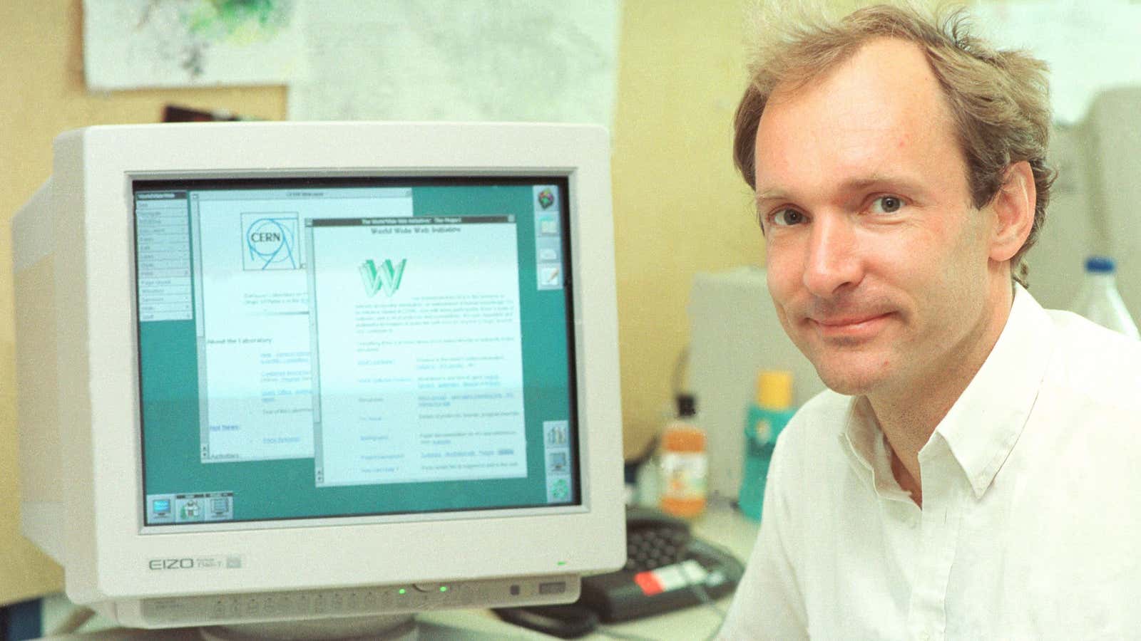 Tim Berners-Lee, the father of the Internet, sits in front of a 1994 computer displaying his creation.