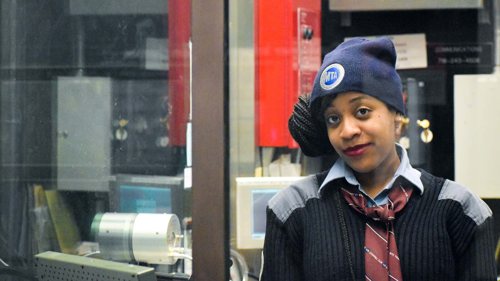 Alexis Simone Webster works in booths in different subway stations. She calls the glass her “only protection.”