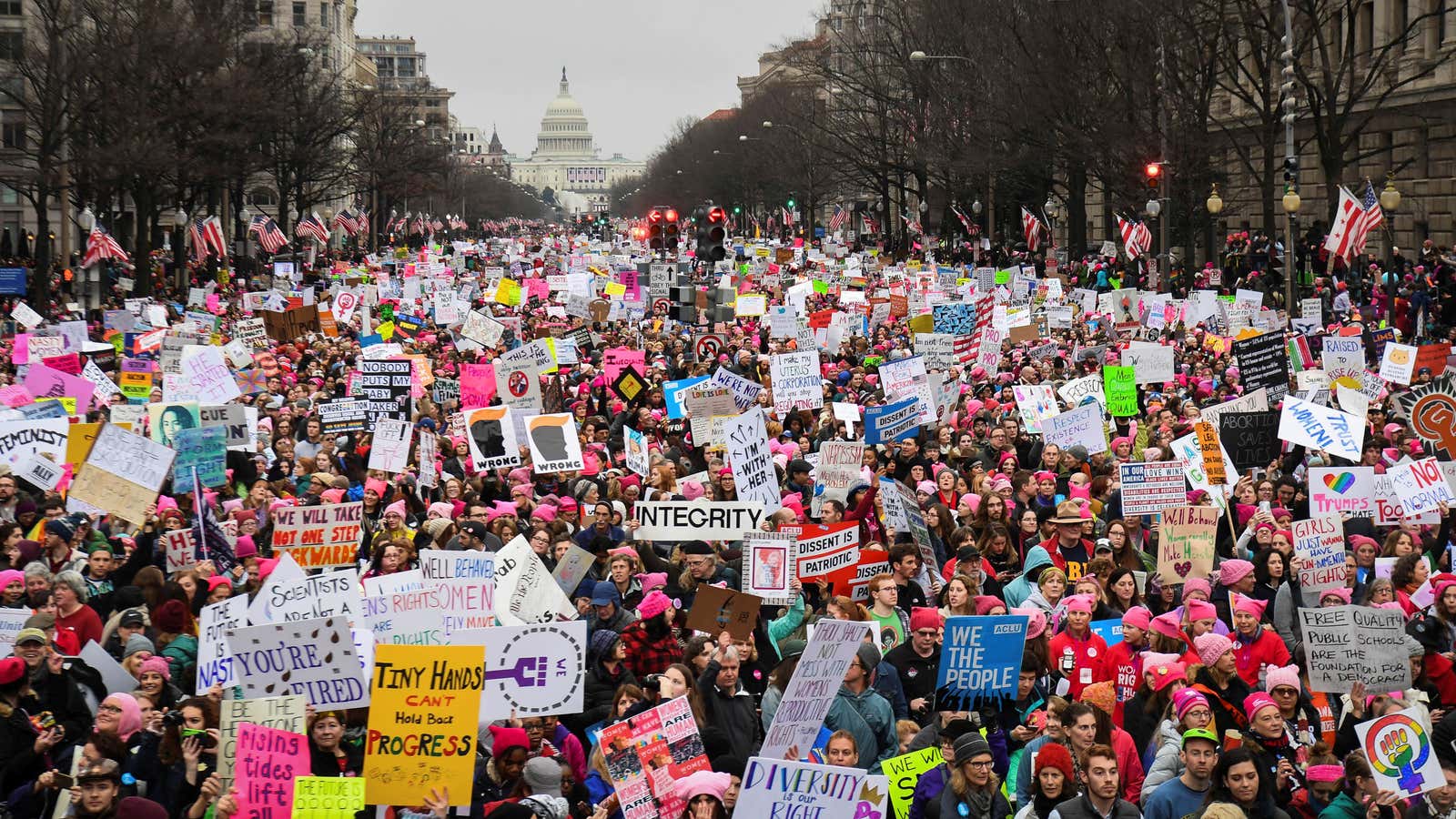Women’s March protestors move down Pennsylvania Avenue in Washington, DC.