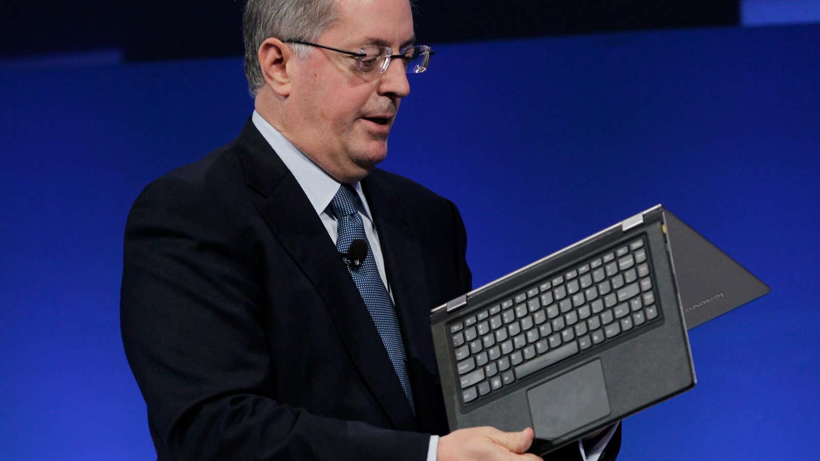 “Oops.” Intel CEO Paul Otellini demonstrates a new Lenovo “Yoga” Ultrabook.