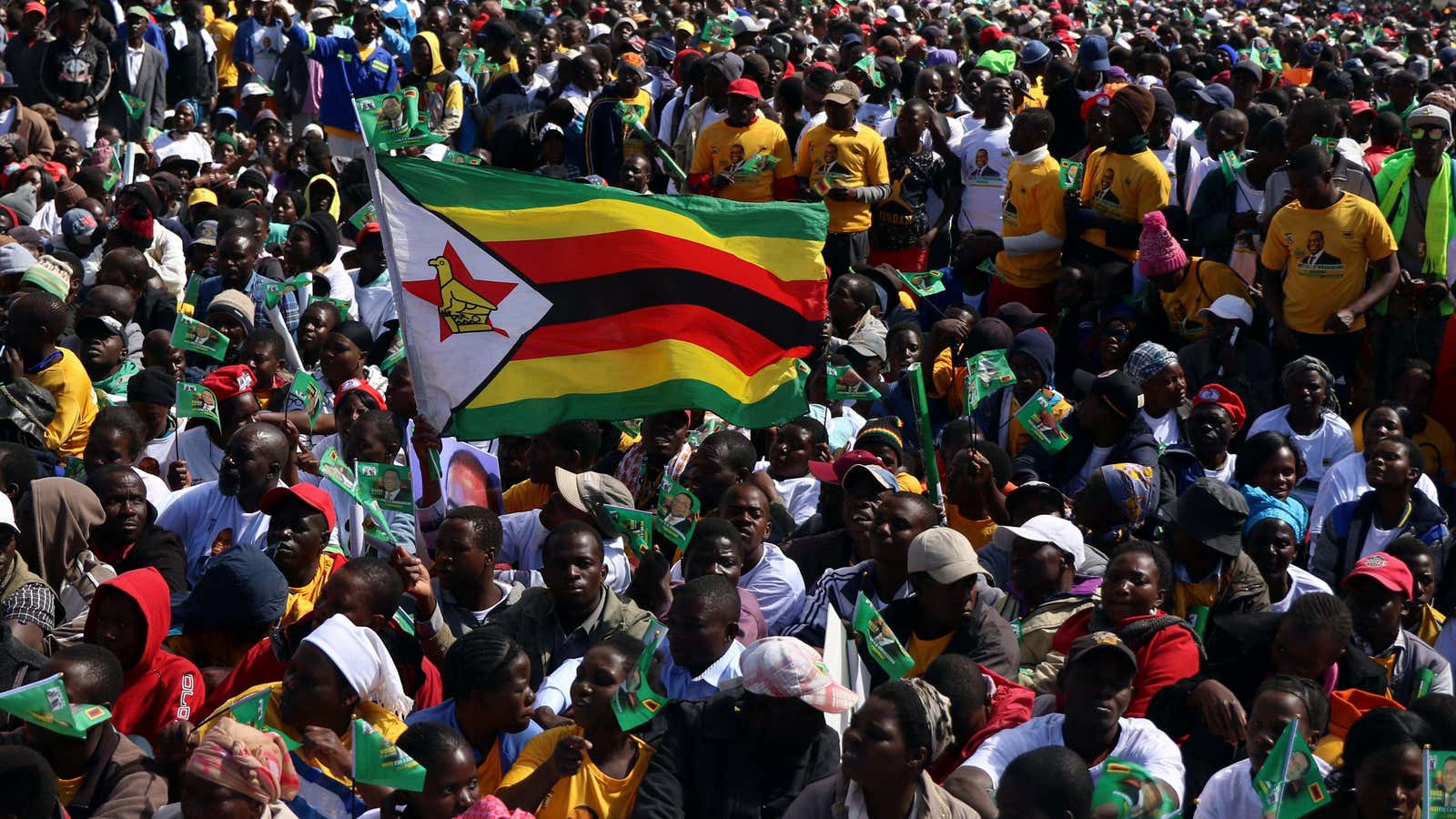 Supporters of president Emmerson Mnangagwa gather at an election rally in Marondera, Zimbabwe