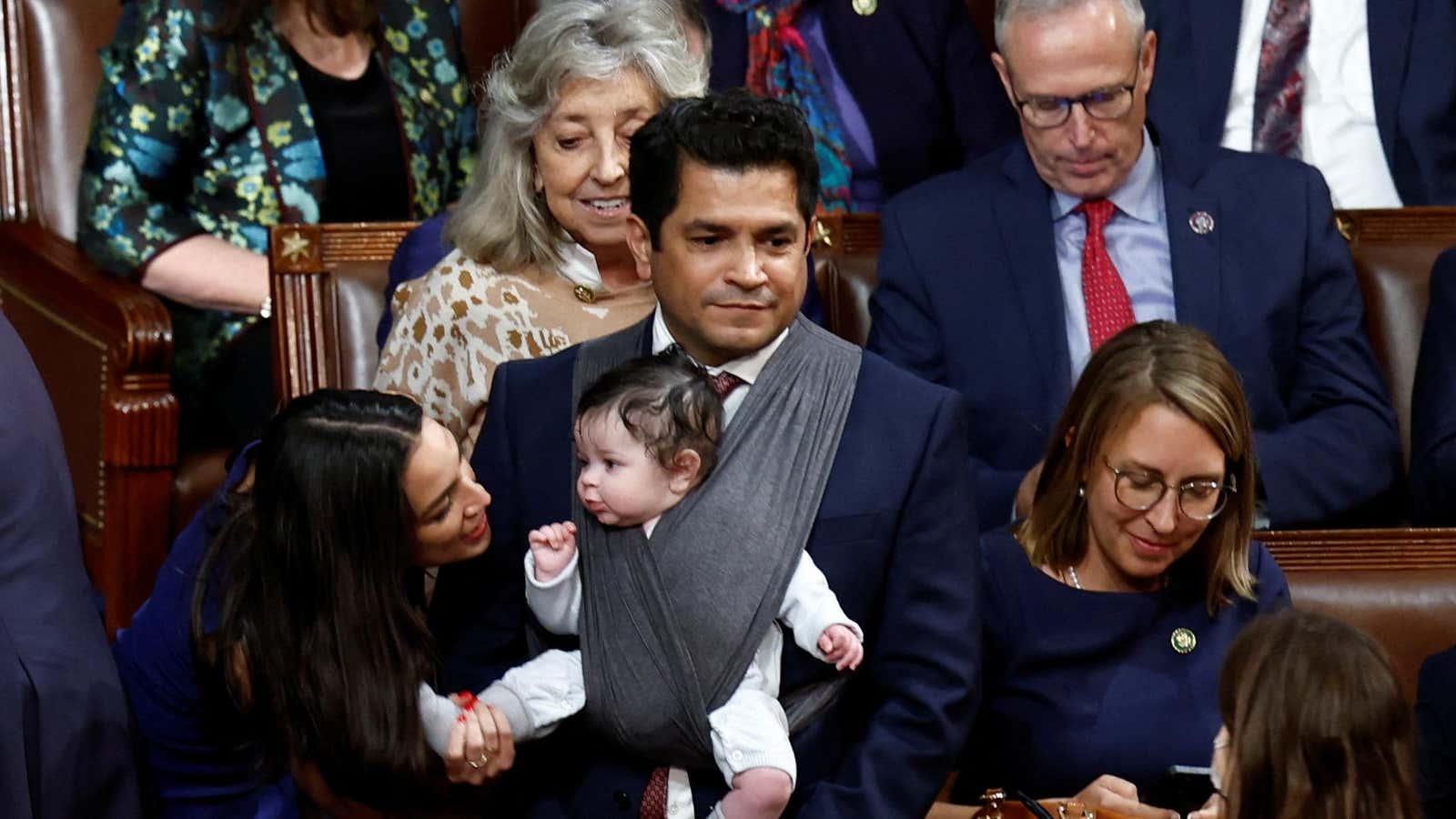 Rep. Jimmy Gomez (D-CA) wears his son, Hodge, on the House floor.