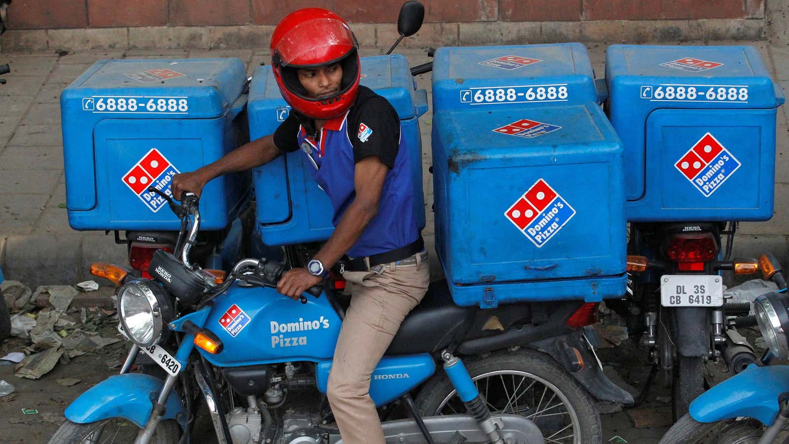 Despite falling profits, global fast-food chains are continuing to expand in India