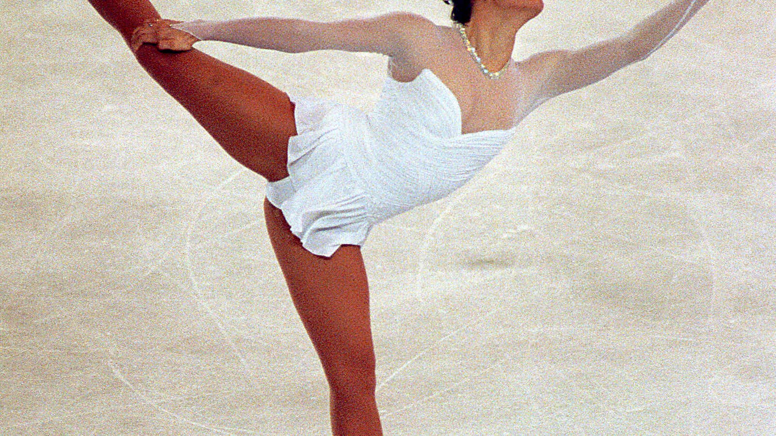 Nancy Kerrigan competing at the 1994 Winter Olympics in a wedding dress-inspired costume by Vera Wang.