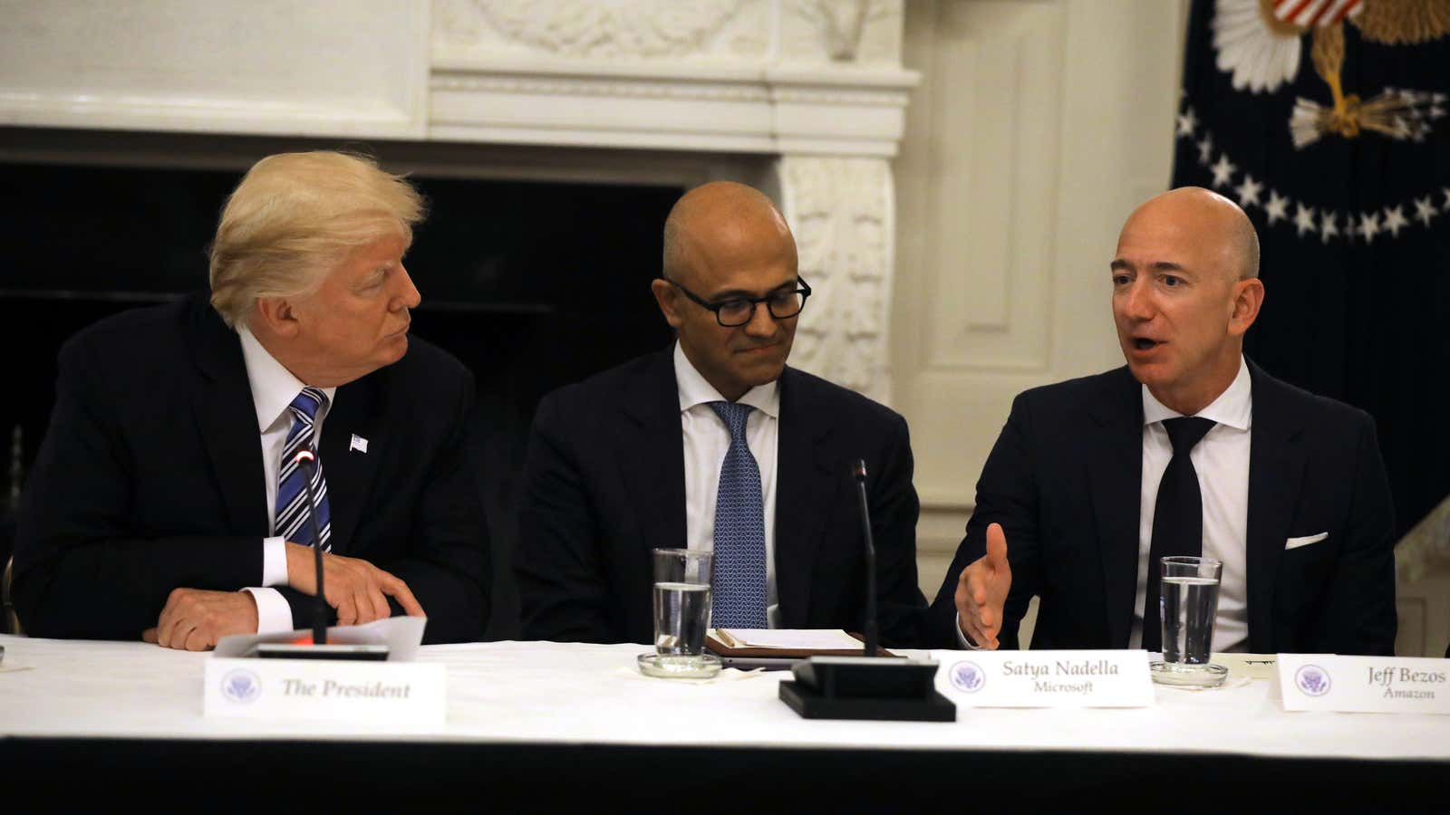 US president Donald Trump has made little secret of his disdain for Amazon CEO Jeff Bezos (right).
