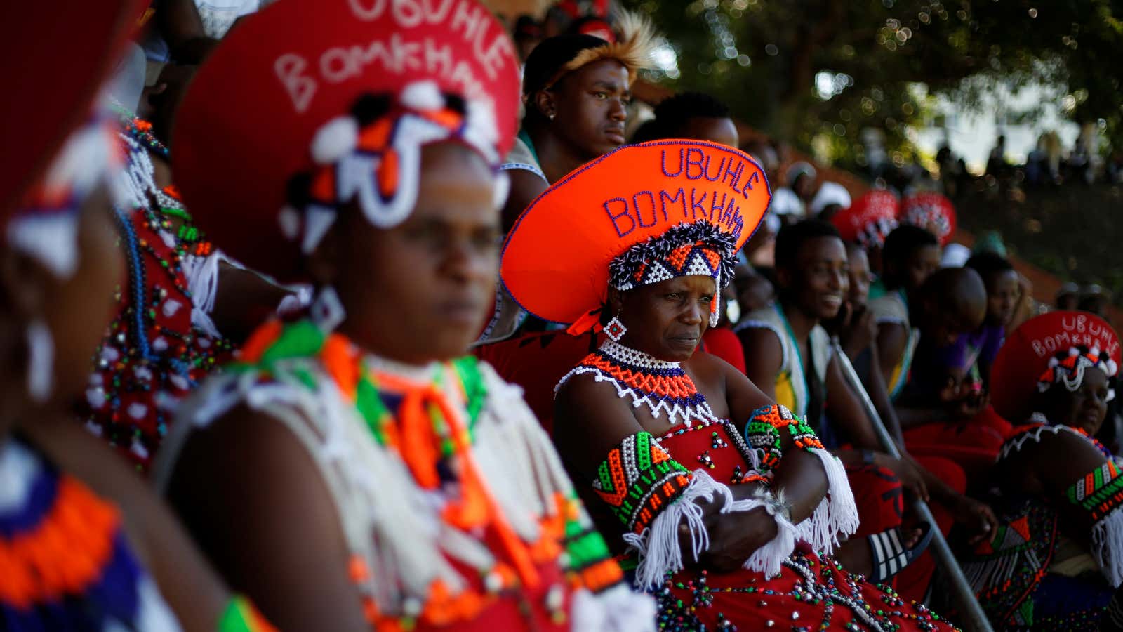 Contestants watch others perform during a Zulu dance competition in Durban.
