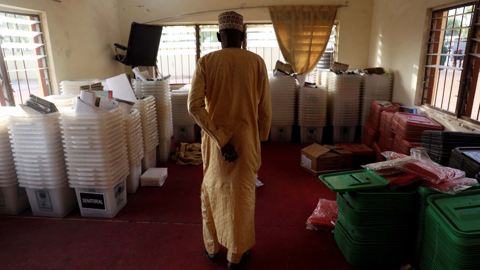 A worker from Nigerias electoral commission in Daura, northern Nigeria with electoral materials at following the postponement of the presidential election Feb. 16, 2019.
