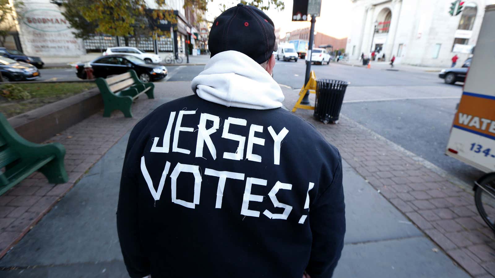 Ed Lippman, 58, wears a message on his jacket on Election Day while walking home, Tuesday, Nov. 6, 2012, in Hoboken, N.J.