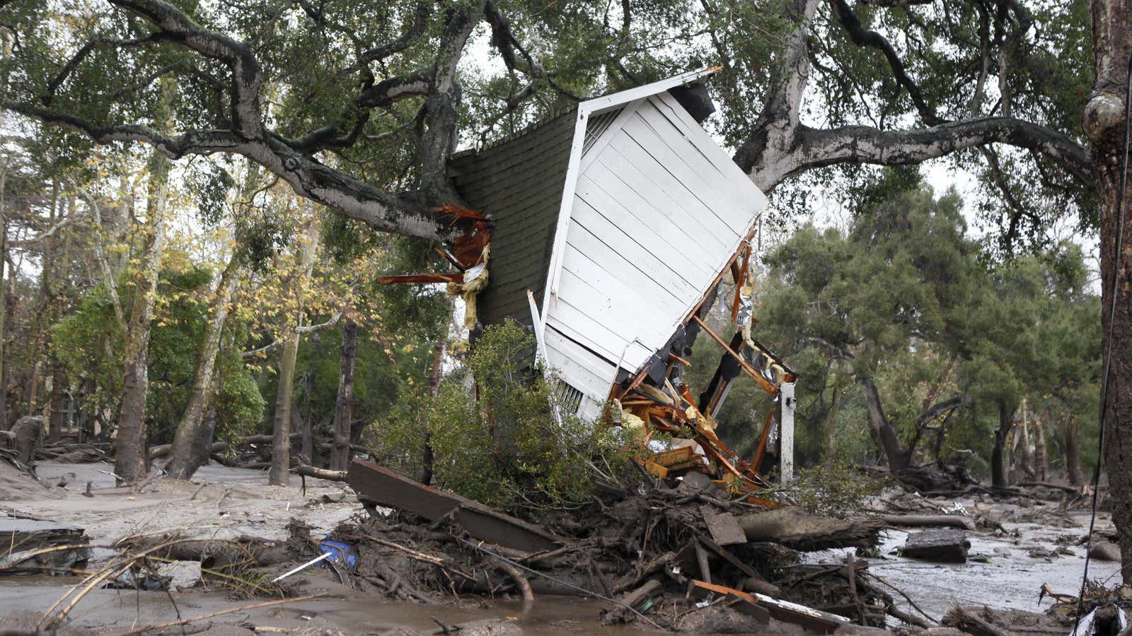 Several homes were swept away before dawn Tuesday when mud and debris roared into neighborhoods in Montecito from hillsides stripped of vegetation during a recent wildfire.