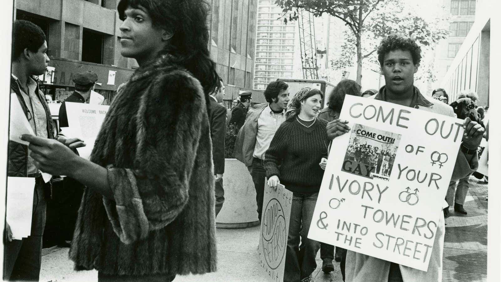 A 1970 photo of Marsha P. Johnson handing out flyers in support of Gay Students at NYU.