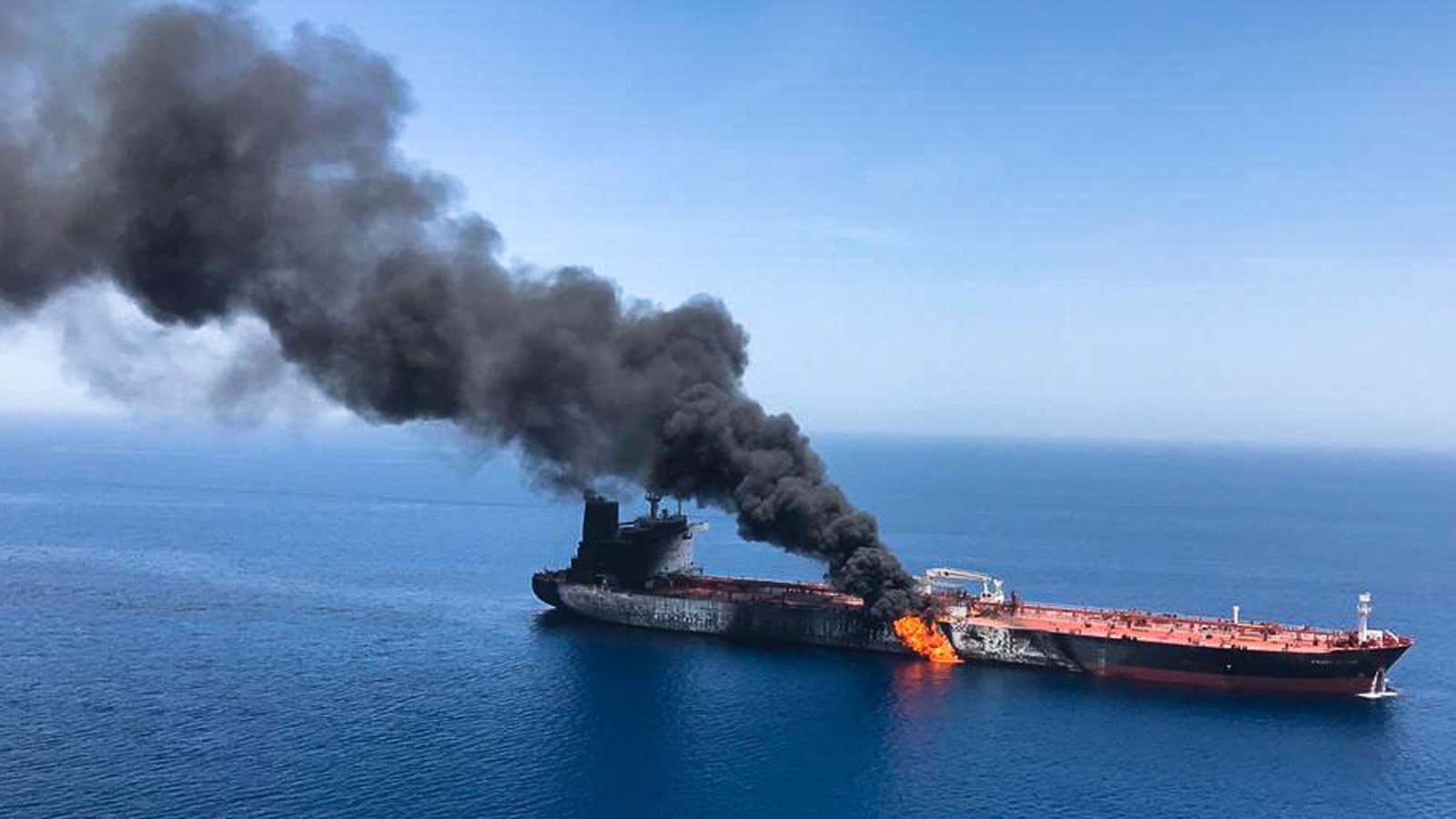 An oil tanker on fire in the Gulf of Oman in June 2019.