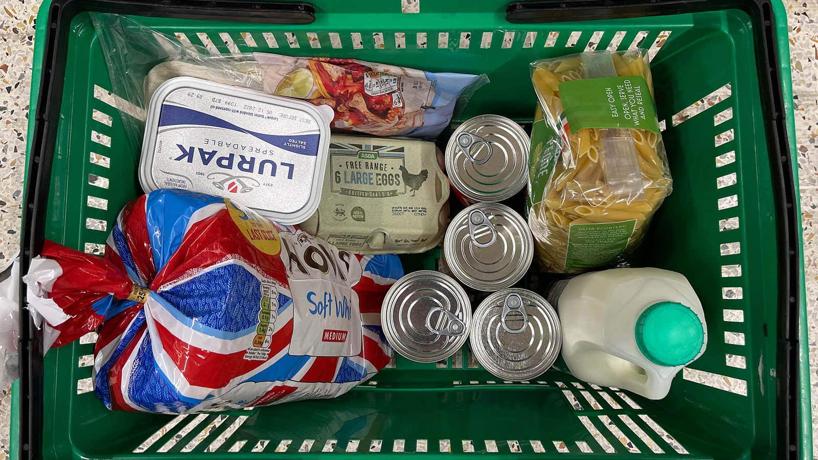 An Asda shopping basket containing groceries taken on October 19, 2022 in Manchester, United Kingdom.
