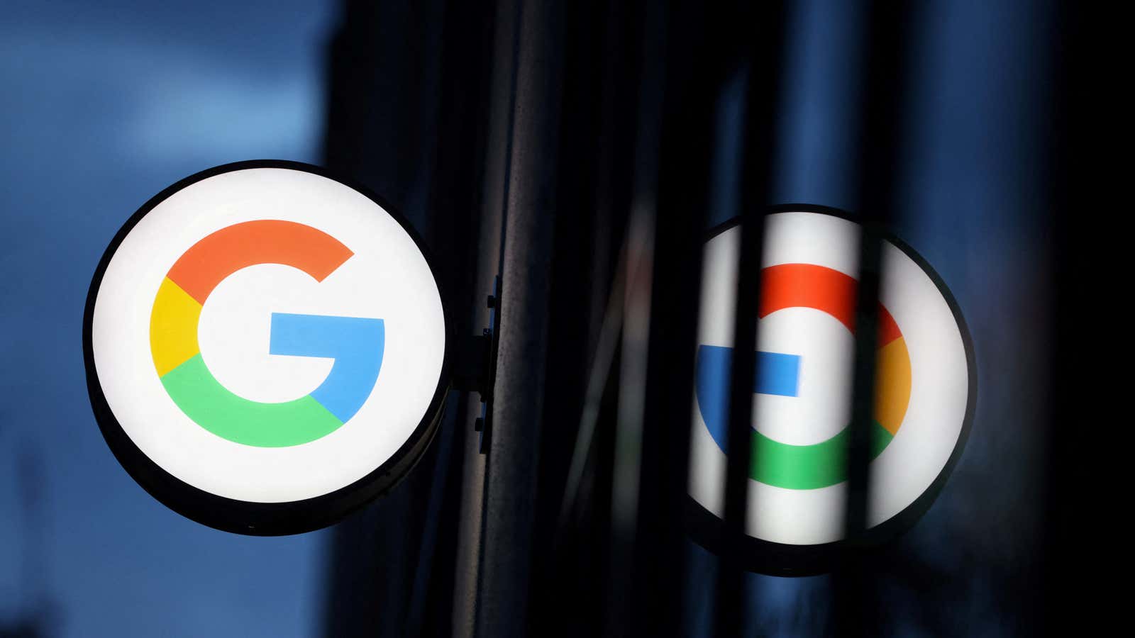 FILE PHOTO: The logo for Google LLC is seen at the Google Store Chelsea in Manhattan, New York City, U.S., November 17, 2021. REUTERS/Andrew Kelly/File…