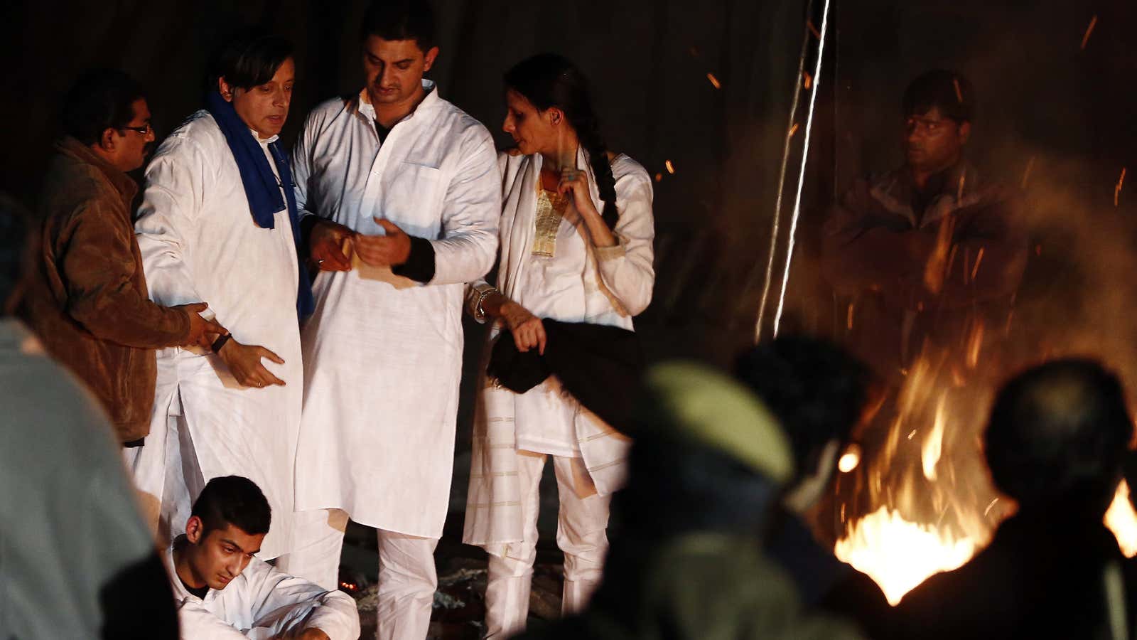 Shashi Tharoor, a minister in the Indian government, at his wife’s funeral pyre earlier today.