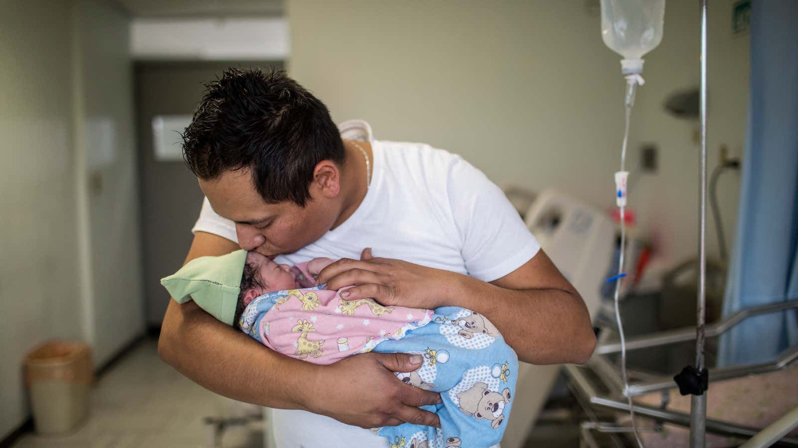 Yair Cruz, 26, holds his newborn baby girl Mia Gisele, his third child, at the Instituto Nacional de Perinatología (INPER) hospital, in Mexico City, Mexico, on February 21, 2018.