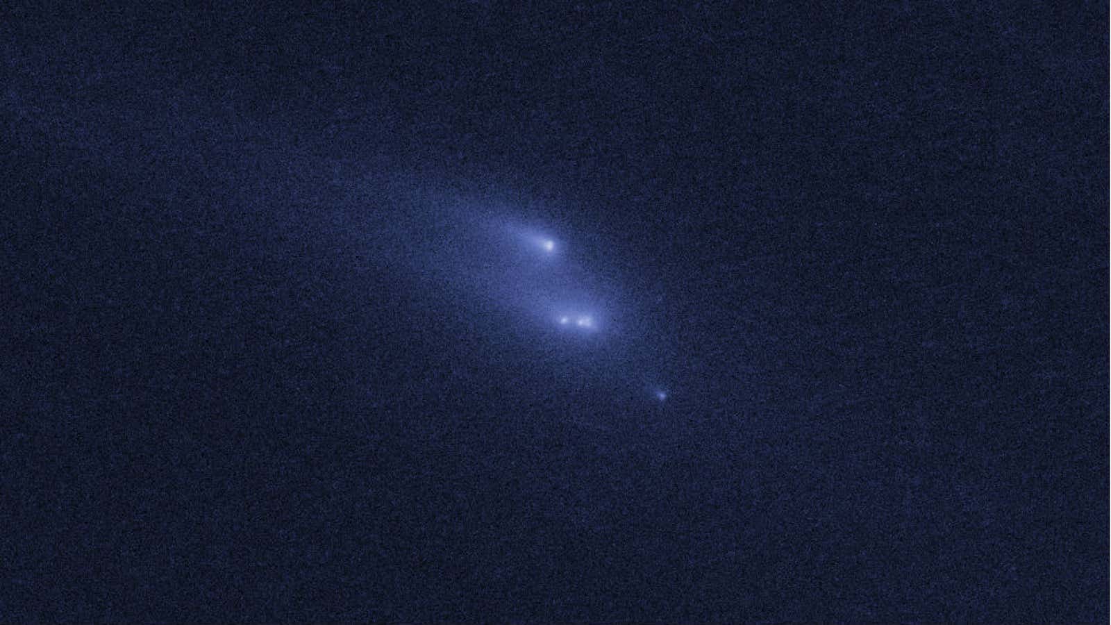 An asteroid similar to this one spotted by the Hubble telescope will fly by closer to Earth than the moon Friday morning.